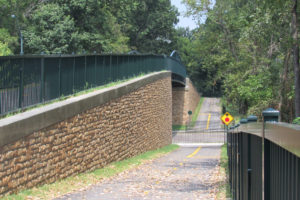 Ohio to Erie trail bridge connects people via safe transportation over a busy roadway.